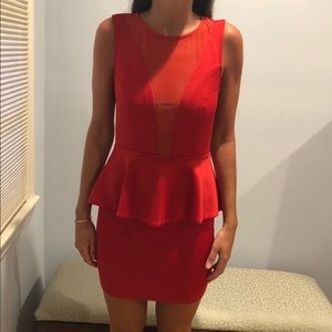 Lightly worn, red fitted peplum dress, open back